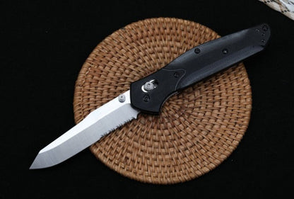 Utensile pieghevole da esterno BM940 con manico in G10 e superficie stonewashed