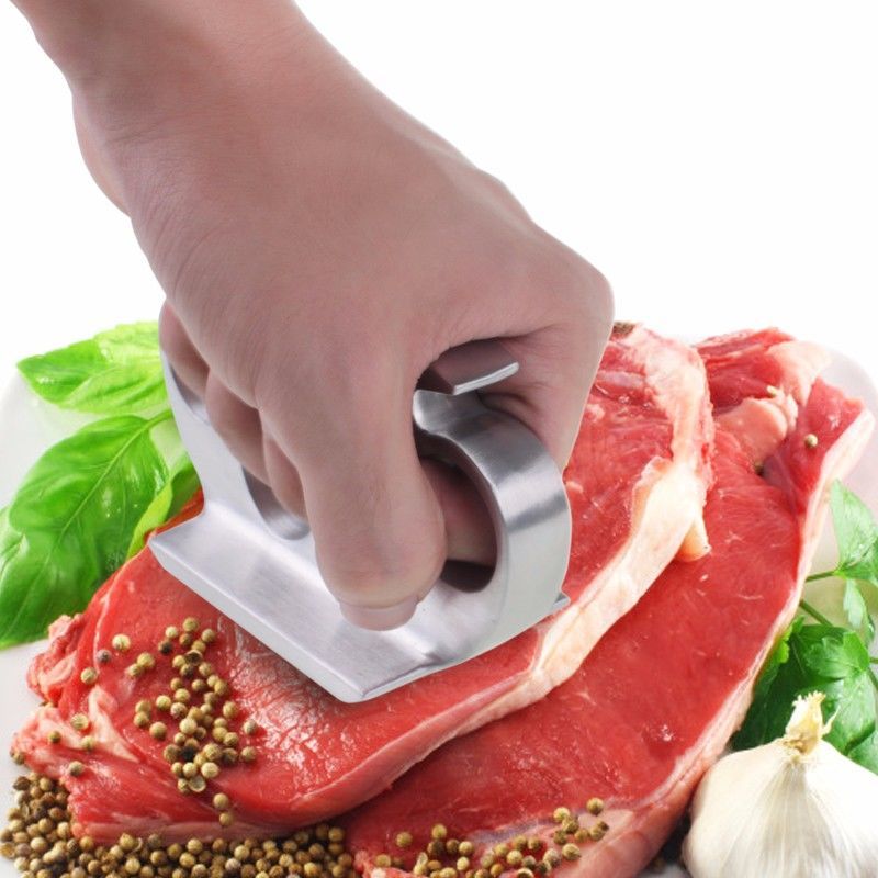 Utensile d'argento per cucinare all'aperto