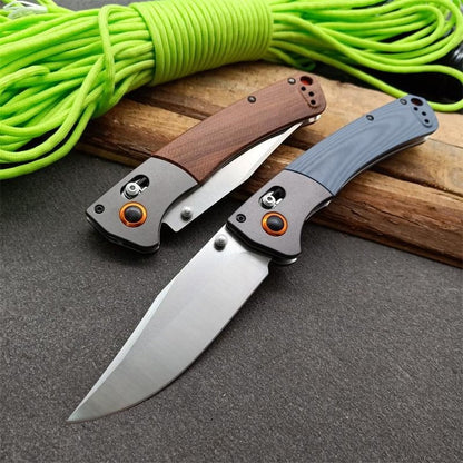 BM15080 Herramienta plegable para exteriores con mango G10 y mango de sándalo