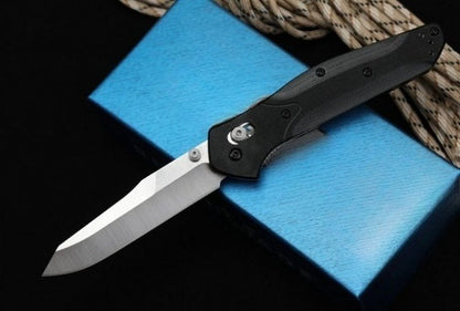 Utensile pieghevole da esterno BM940 con manico in G10 e superficie stonewashed