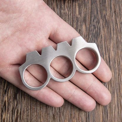 Schlagring-Briefbeschwerer