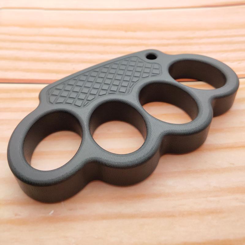 Non-Metal 4-Finger Brass Knuckles Duster Paperweight Self Defense - Tacsafeworld EDC Gadgets - Tacsafeworld EDC Gadgets