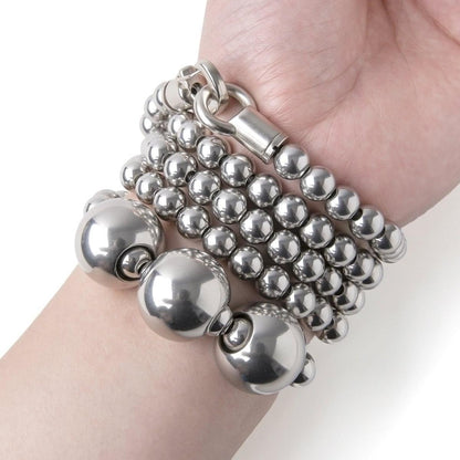 Braccialetto con perle Acala interamente in acciaio inox per autodifesa