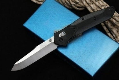 Utensile pieghevole da esterno BM940 con manico in G10 e superficie stonewashed